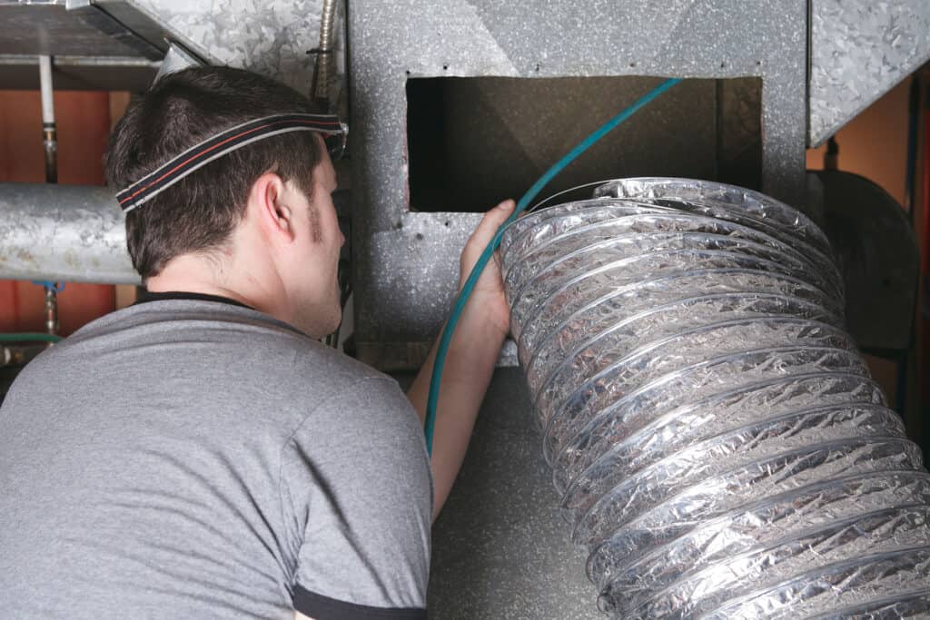 Duct cleaning during restoration.